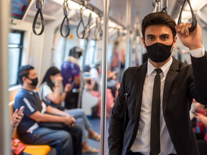 People on Subway Train wearing Masks